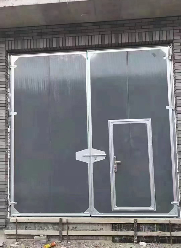 托克逊工业平开门在大型设备制造车间的应用实例